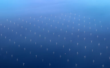 Photo of windmills in the ocean
